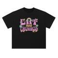 Eat More Churros Retro Graphic T-Shirt – 90s Throwback Vintage Pastel Theme Park Snack Tee Funny Distressed Thrift Streetwear Style– Drop Shoulder Heavyweight Tee